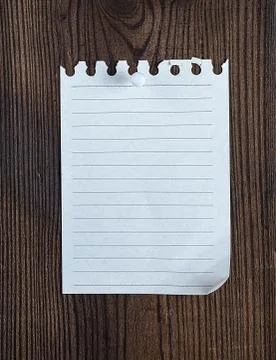 Empty notepad paper attached with a button Stock Photos