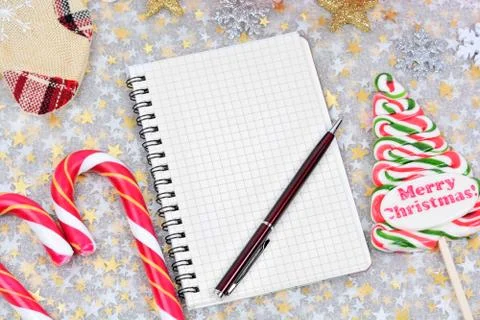 Empty notepad with pen and christmas ornament Stock Photos