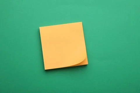 Empty notes on green background, top view. Space for text Stock Photos