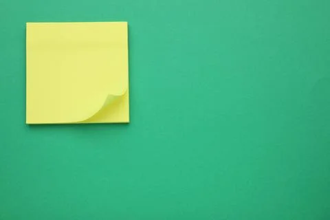 Empty notes on green background, top view. Space for text Stock Photos