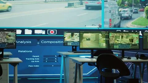 Empty observation room office with CCTV surveillance footage on a big screen Foto stock