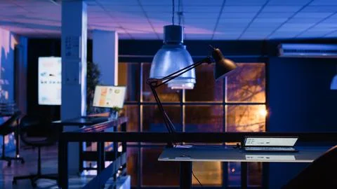 Empty office with analytics and diagrams on screen Stock Photos
