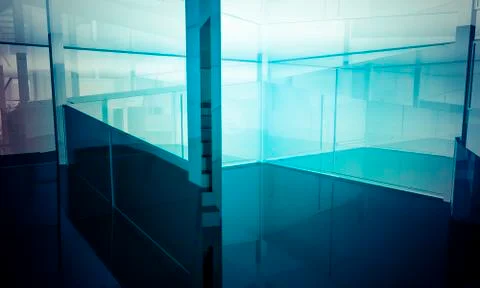 Empty office with columns and large windows, indoor building. business space  Ilustración de archivo