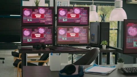 Empty office with computer monitors displaying system error and hacking attack Stock Footage 227612691