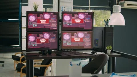 Empty office with computer monitors displaying system error and hacking attack Foto stock