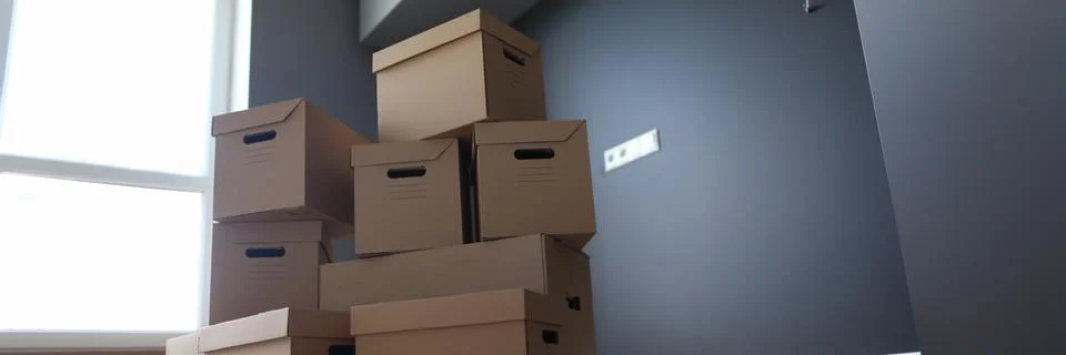 Empty office interior, boxes stand near window Stock Photos