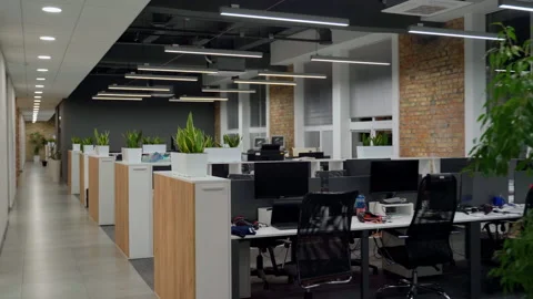 Empty office with pc and monitors 4K. Shot with movement Video stock 162557593