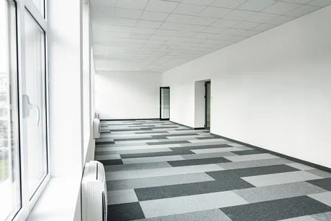 Empty office space With Checkered Floor and Windows Stock Photos