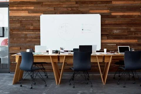 Empty office, table and tech for coworking startup, insurance pie chart or .. Stock Photos