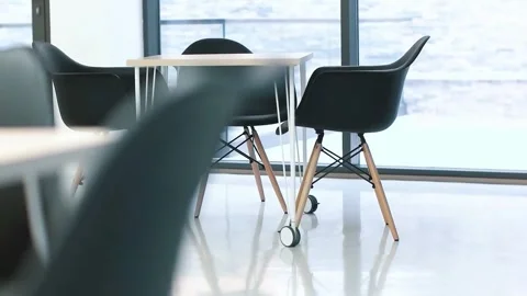 Empty office workspace bright natural light in modern business building. Stock Footage 294741715