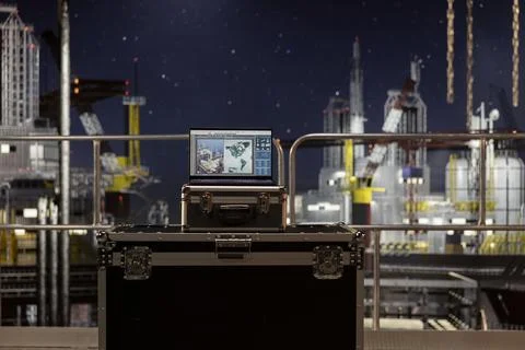 Empty offshore platform with a laptop running maintenance software Stock Photos