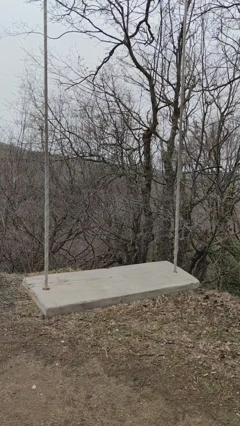 Empty old abandoned swing Stock Footage 234201923