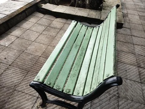 Empty old bench in the park Stock Photos
