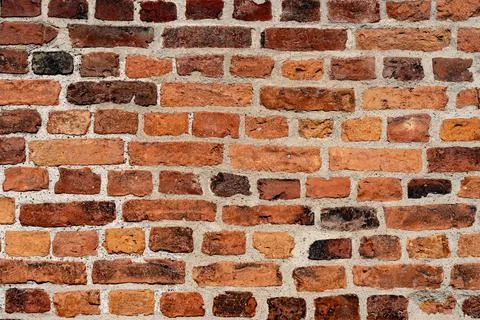 Empty old black red brick wall texture background from Sweden. copy space Stock Photos