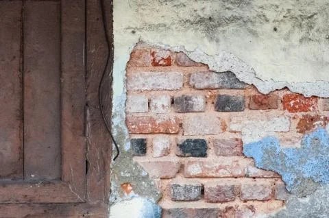 Empty Old Brick Wall Texture with window. Painted Distressed Wall Surface. Gr Stock Photos