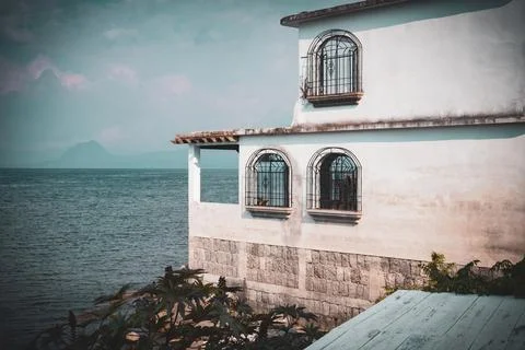 An empty, old building on the shore of the Atitlan lake in Guatemala Stock Photos