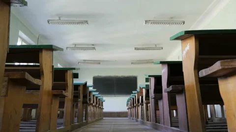 Empty Old Classroom From The Aisle Between Desks.  스톡 동영상 129176142