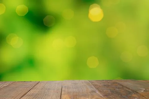 Empty old Dark wooden rustic table top made of planks with uneven edges on bl Foto stock