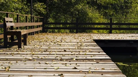 Empty old deck on a lake Видео 94635322
