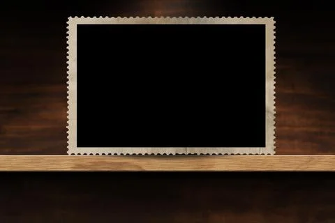 Empty Old Fashioned Photo Frame on a Wooden Shelf Stock Photos