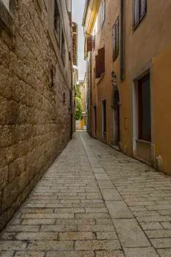 Empty old street in Porec Stock Photos