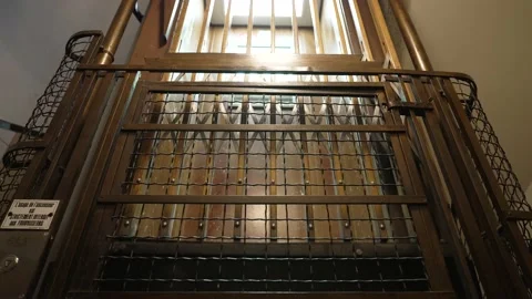 Empty old vintage elevator ascending in the building Stockbeeldmateriaal 156224425