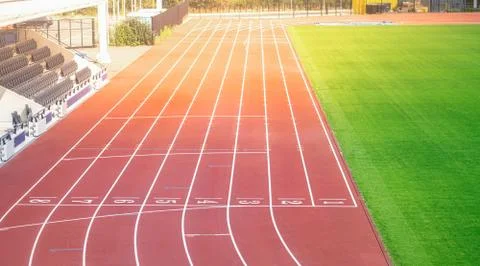 Empty olympic style running track for athletics Stock Photos