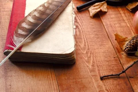 Empty open book, old accessories and post cards. romantic vintage background. Stock Photos