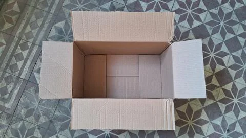 Empty open brown cardboard box viewed from a high angle Stock Photos