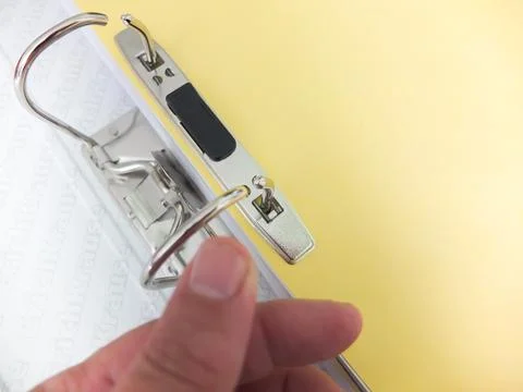 Empty open folder for papers with a metal clip, close up Stock Photos