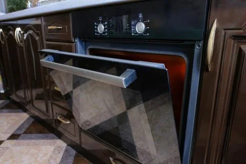 Empty, open modern oven close-up. Built-in kitchen furniture 스톡 사진
