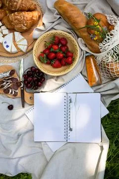 Empty open notepad. Summer paper mockup on the background of bright picnic Фото