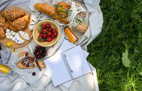 Empty open notepad. Summer paper mockup on the background of bright picnic Stock Photos