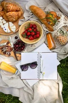 Empty open notepad. Summer paper mockup on the background of bright picnic Stock Photos