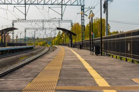 Empty open street train station at sunday morning Foto stock