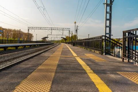 Empty open street train station at sunday morning Stock Photos
