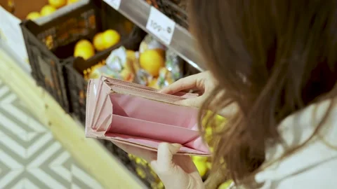 Empty open wallet in female hands. Stock Footage 194011501
