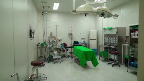 Empty operation room with surgery bed and surgery light Stock Footage 334331499