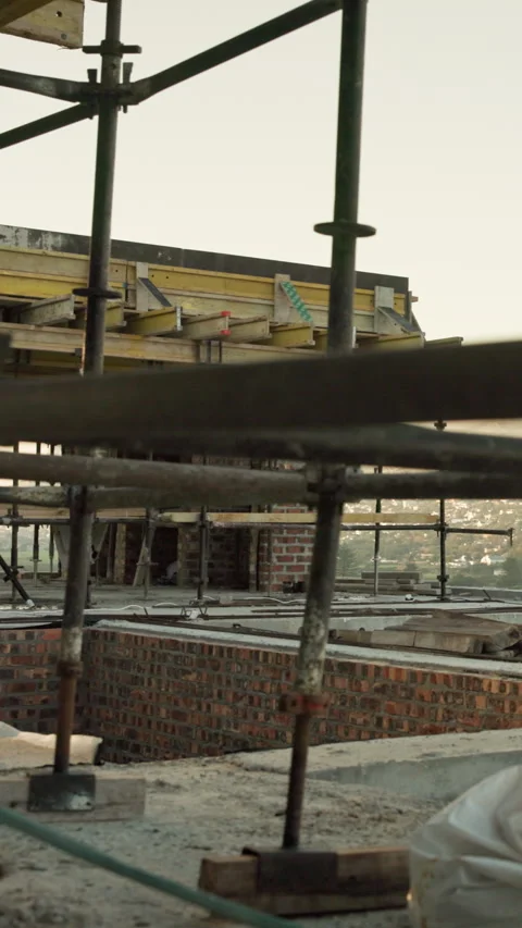 Empty, outdoor and scaffolding for building, construction and renovation project Stock Footage 340965671