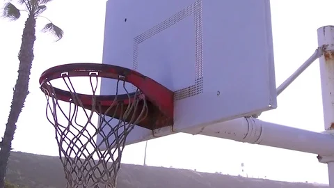 An empty outdoor blacktop court at the beach, slow motion. Stock Footage