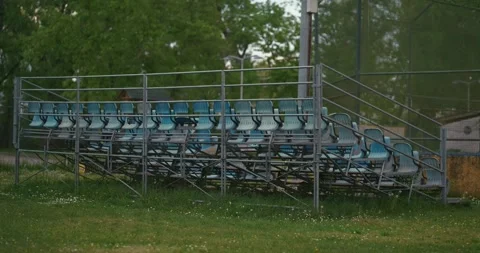 Empty outdoor bleachers with plastic seats Stock Footage 332948644
