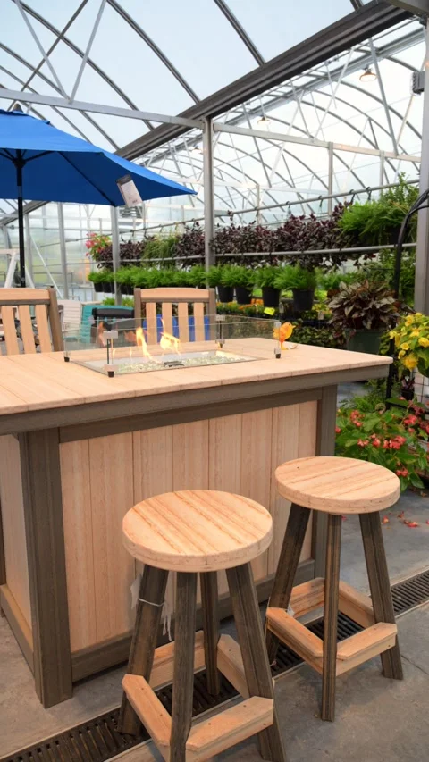 An empty outdoor cafe or restaurant patio seating area with wooden stools and Stock Footage 338168822