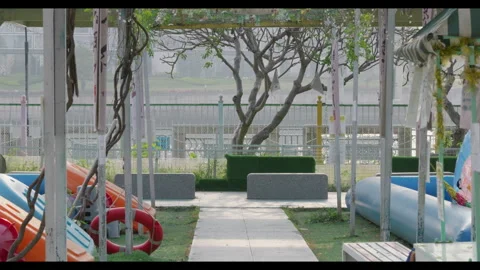 Empty Outdoor Playground Path with Inflatable Equipment Stock Footage 331008888