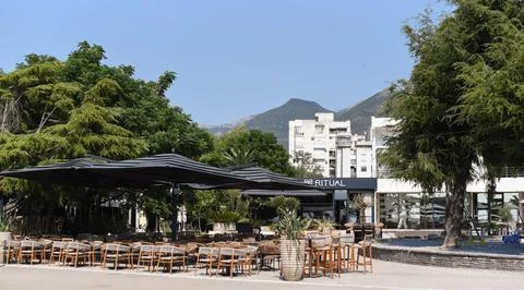 Empty outdoor seating area of Ritual restaurant in Bar, Montenegro Stock Photos