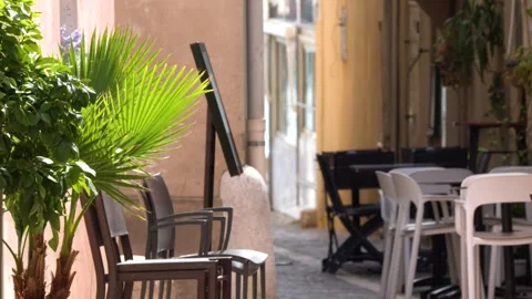Empty Outdoor Sidewalk Cafe Seating in Cassis France Stock Footage 342574294