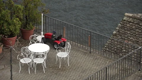 An empty outdoor table by the lake Stock Footage 143824384