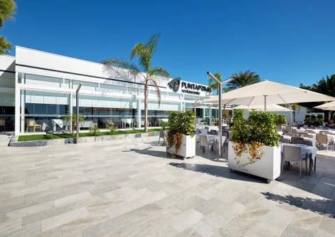 Empty outdoors restaurant in Punta Prima. Spain Stock Photos