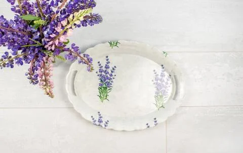Empty oval tray for serving the table in vintage style. Flat lay home decorat Stock Photos