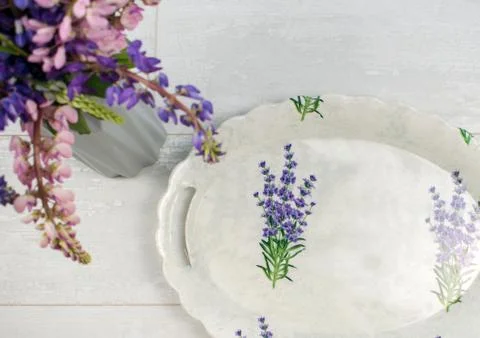 Empty oval tray for serving the table in vintage style. Flat lay home decorat Stock Photos