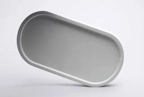 Empty oval white tray on plain background 스톡 사진